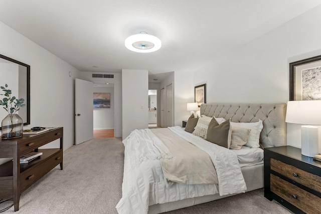 3412 Oak Ridge Rd Unit 208, Minnetonka, MN 55305 - bedroom featuring light carpet and connected bathroom