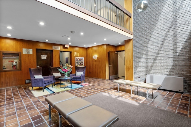 3412 Oak Ridge Rd Unit 208, Minnetonka, MN 55305 - common area with wooden walls, recessed lighting, and a high ceiling