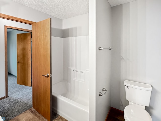 3337 Monroe St S, Fargo, ND 58104 - bathroom with a textured ceiling and  shower combination
