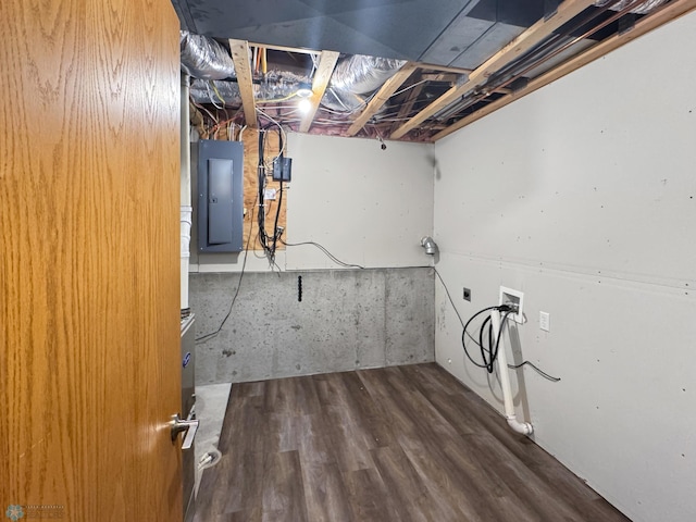 3337 Monroe St S, Fargo, ND 58104 - washroom featuring electric panel, hookup for a washing machine, hookup for an electric dryer, and wood finished floors