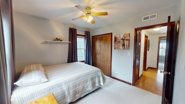 711 5th Ave SW, Austin, MN 55912 - carpeted bedroom with a closet and ceiling fan