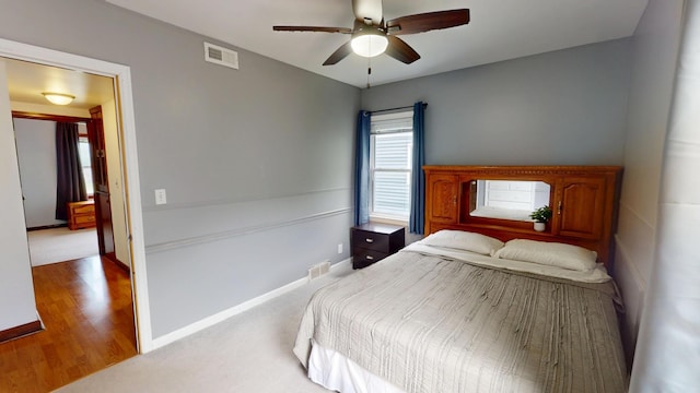 711 5th Ave SW, Austin, MN 55912 - bedroom with wood finished floors and ceiling fan