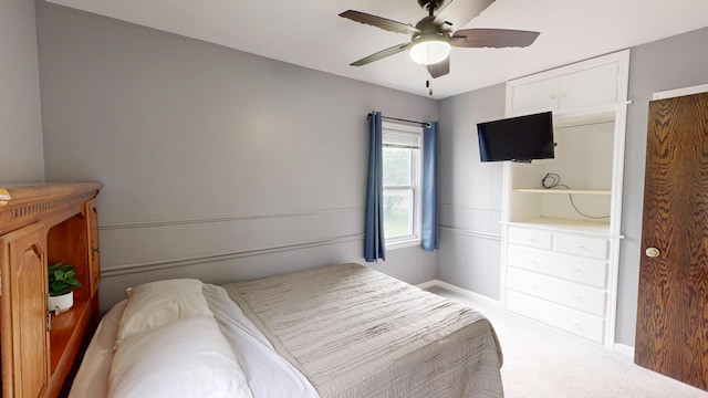 711 5th Ave SW, Austin, MN 55912 - carpeted bedroom with a ceiling fan and baseboards