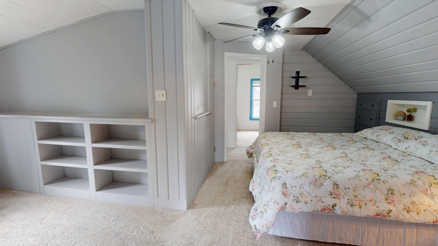 711 5th Ave SW, Austin, MN 55912 - carpeted bedroom featuring vaulted ceiling and ceiling fan
