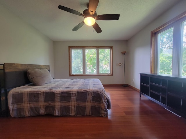 2729 Parkhaven Ct N, Brooklyn Park, MN 55444 - bedroom featuring wood finished floors and ceiling fan