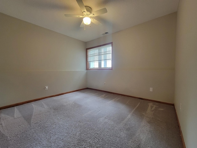 2729 Parkhaven Ct N, Brooklyn Park, MN 55444 - spare room with carpet and a ceiling fan