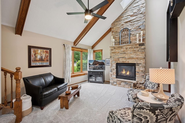 420 Pleasant Crest Cir, Annandale, MN 55302 - living area featuring beam ceiling, a stone fireplace, carpet floors, ceiling fan, and high vaulted ceiling
