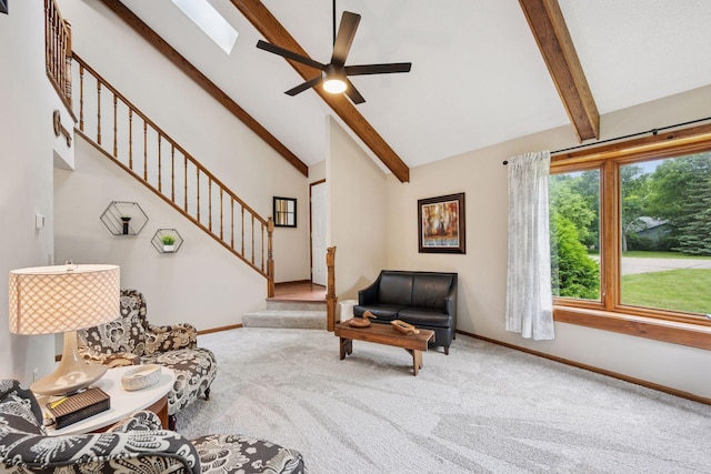 420 Pleasant Crest Cir, Annandale, MN 55302 - carpeted living room with beamed ceiling, stairway, a ceiling fan, and high vaulted ceiling