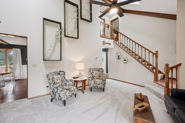 420 Pleasant Crest Cir, Annandale, MN 55302 - living area with ceiling fan, carpet, stairway, beam ceiling, and high vaulted ceiling