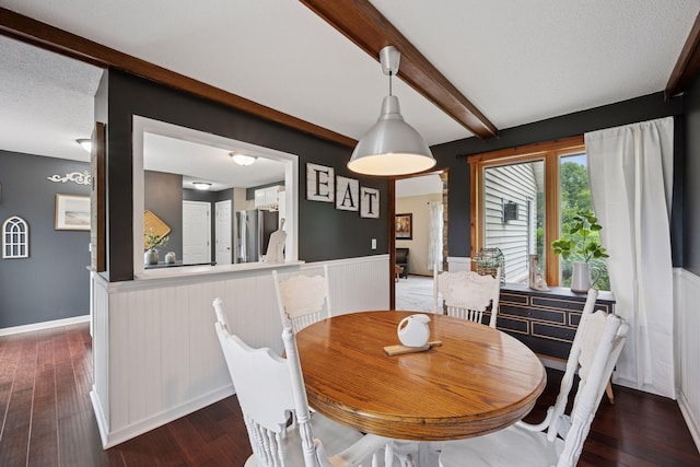 420 Pleasant Crest Cir, Annandale, MN 55302 - dining space featuring beamed ceiling, wainscoting, and wood finished floors