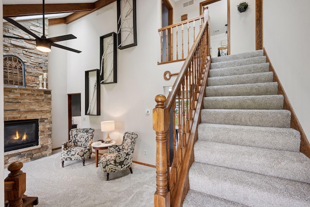420 Pleasant Crest Cir, Annandale, MN 55302 - stairs with a high ceiling, a fireplace, carpet, and ceiling fan