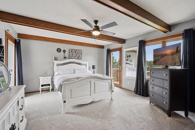 420 Pleasant Crest Cir, Annandale, MN 55302 - bedroom with light carpet, beamed ceiling, a textured ceiling, access to exterior, and ceiling fan