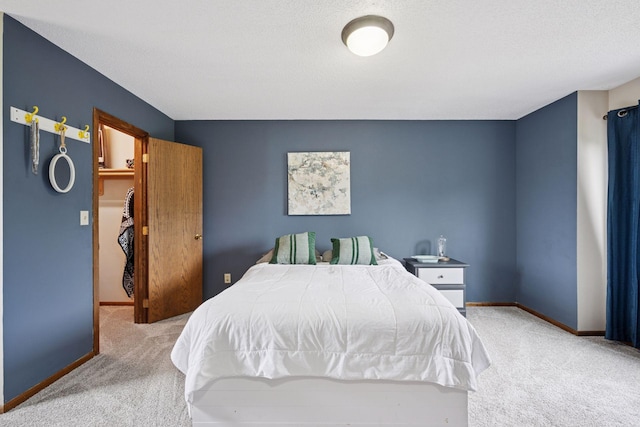 420 Pleasant Crest Cir, Annandale, MN 55302 - carpeted bedroom featuring a walk in closet and baseboards