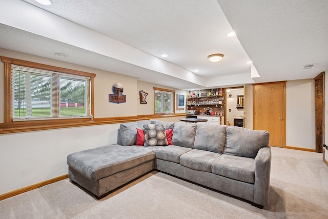 420 Pleasant Crest Cir, Annandale, MN 55302 - living room with wet bar, light colored carpet, and recessed lighting