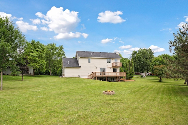 420 Pleasant Crest Cir, Annandale, MN 55302 - back of property featuring a fire pit, a yard, and a wooden deck