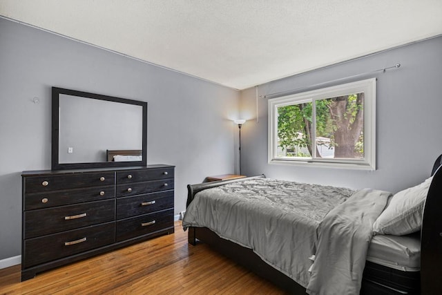 2717 22nd St, Minneapolis, MN 55406 - bedroom featuring wood finished floors