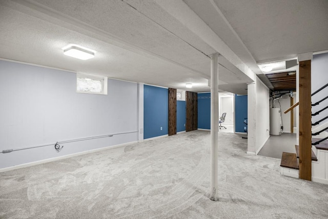 2717 22nd St, Minneapolis, MN 55406 - below grade area featuring carpet floors, stairs, gas water heater, and a textured ceiling