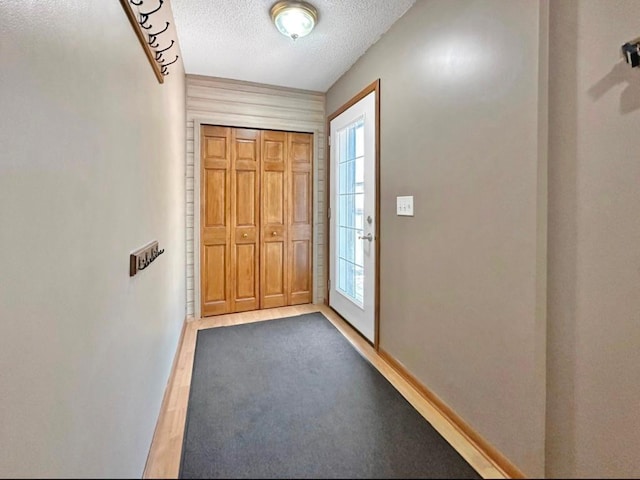 2117 Isleview Rd, Grand Rapids, MN 55744 - entryway with a textured ceiling and wood finished floors