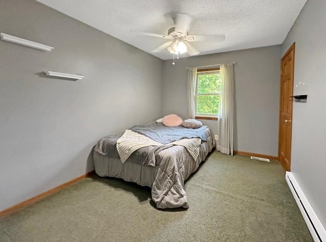 2117 Isleview Rd, Grand Rapids, MN 55744 - bedroom featuring a baseboard radiator, light colored carpet, a textured ceiling, and a ceiling fan