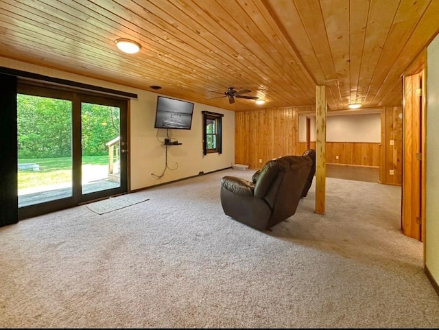 2117 Isleview Rd, Grand Rapids, MN 55744 - carpeted living room featuring wood ceiling and wooden walls