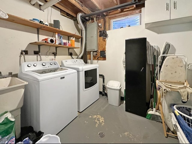 2117 Isleview Rd, Grand Rapids, MN 55744 - washroom with washing machine and clothes dryer, electric panel, and cabinet space