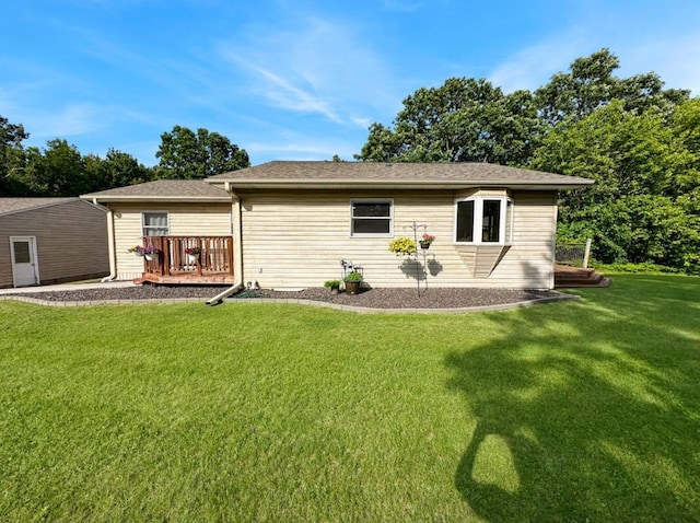 2117 Isleview Rd, Grand Rapids, MN 55744 - rear view of house featuring a lawn and a wooden deck
