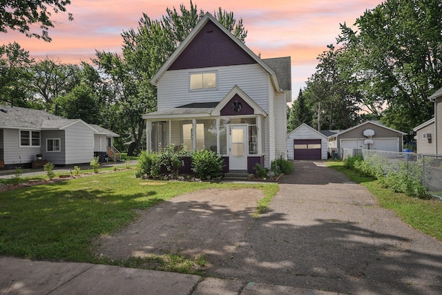 6429 Maple St, North Branch, MN 55056 - victorian-style house featuring a detached garage, an outbuilding, and driveway