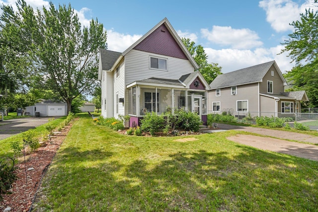 6429 Maple St, North Branch, MN 55056 - victorian home featuring a sunroom and a shingled roof