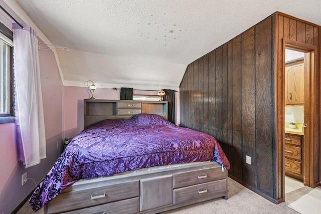 6429 Maple St, North Branch, MN 55056 - bedroom with a textured ceiling, lofted ceiling, and light carpet