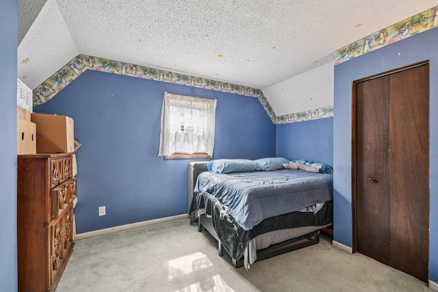 6429 Maple St, North Branch, MN 55056 - carpeted bedroom with vaulted ceiling and a textured ceiling