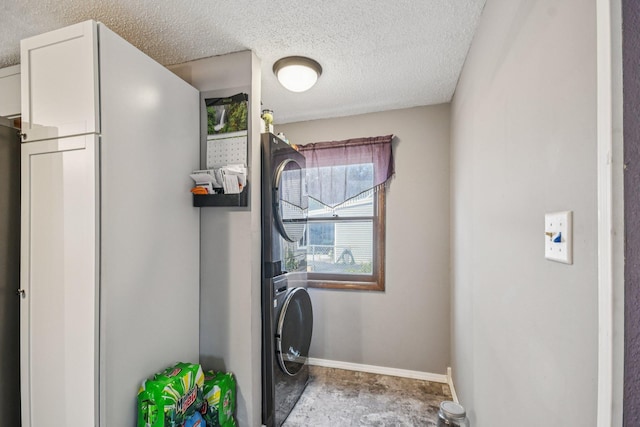 6429 Maple St, North Branch, MN 55056 - laundry room featuring estacked washer and dryer and a textured ceiling