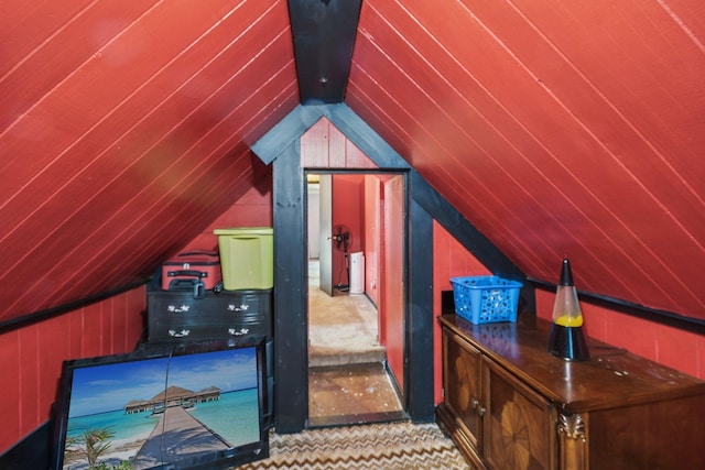 6429 Maple St, North Branch, MN 55056 - bonus room with lofted ceiling, wood walls, and carpet floors