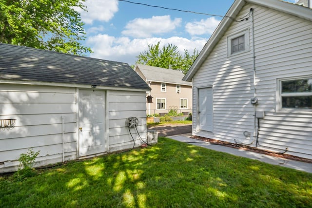 6429 Maple St, North Branch, MN 55056 - view of green lawn with an outdoor structure
