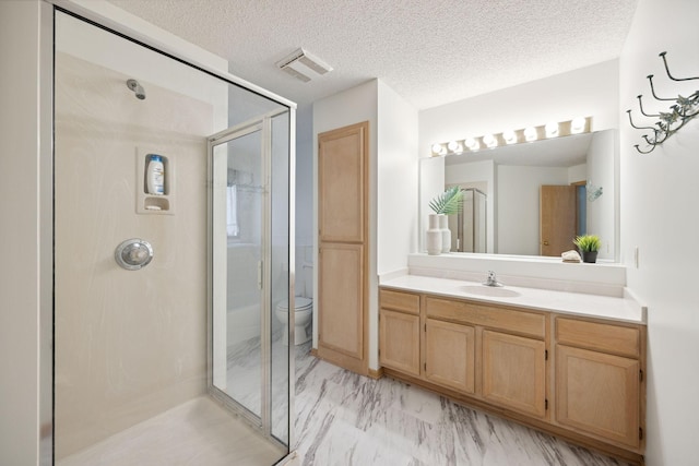 790 Winterberry Dr, Woodbury, MN 55125 - full bath with a shower stall, vanity, a textured ceiling, and marble look tiles