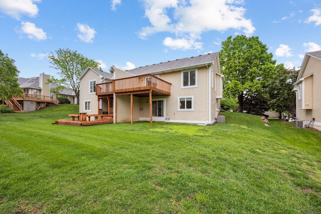 790 Winterberry Dr, Woodbury, MN 55125 - back of house featuring a wooden deck, a lawn, and a patio