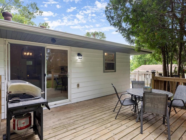 44775 Bending Ave, Fish Lake Twp, MN 55032 - wooden terrace with outdoor dining area