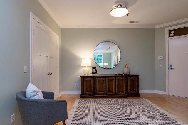 510 Grand Ave Unit 101, Saint Paul, MN 55102 - living area featuring light wood-type flooring and crown molding