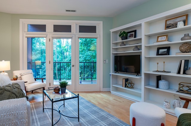 510 Grand Ave Unit 101, Saint Paul, MN 55102 - living room with wood finished floors and built in features