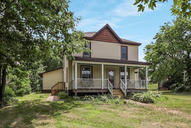 204 Main Ave, Wheeler, WI 54772 - view of front facade with a porch and a front yard