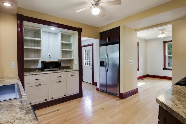 204 Main Ave, Wheeler, WI 54772 - kitchen with appliances with stainless steel finishes, open shelves, ceiling fan, and light wood finished floors