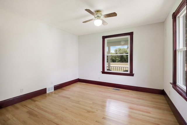 204 Main Ave, Wheeler, WI 54772 - spare room with light wood-type flooring and ceiling fan