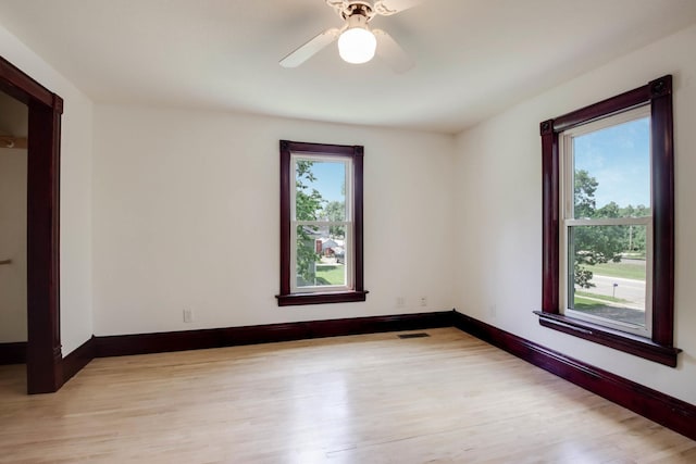 204 Main Ave, Wheeler, WI 54772 - spare room featuring light wood-style floors and a ceiling fan