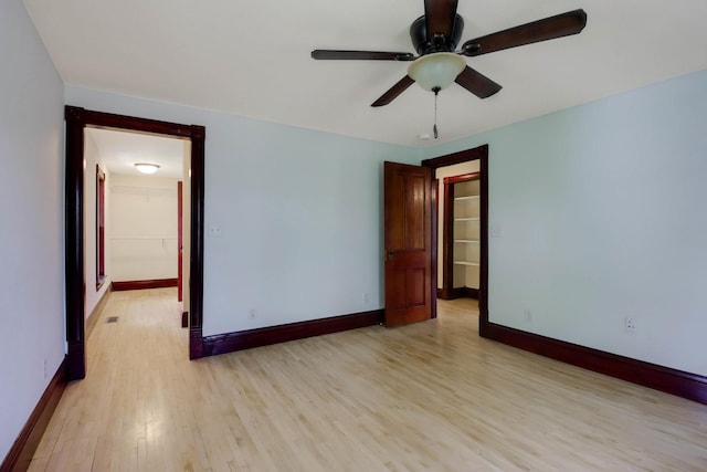 204 Main Ave, Wheeler, WI 54772 - unfurnished room featuring light wood-style flooring and ceiling fan
