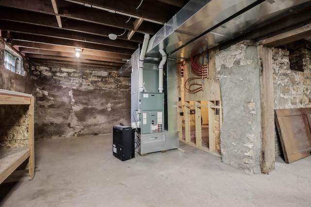 204 Main Ave, Wheeler, WI 54772 - unfinished below grade area with heating unit