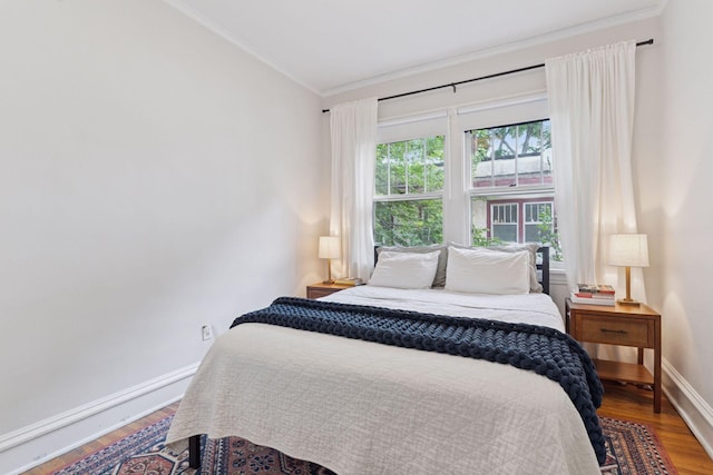 3533 Pleasant Ave Unit 3, Minneapolis, MN 55408 - bedroom with crown molding and wood finished floors