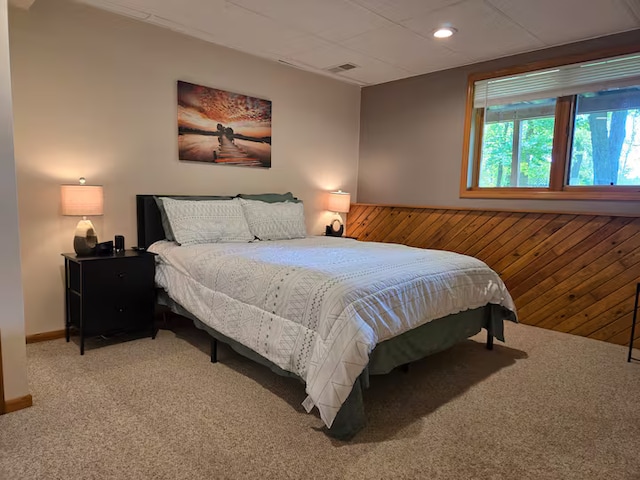 25463 County Road 267, Cohasset, MN 55721 - carpeted bedroom with wood walls