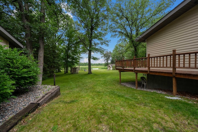 25463 County Road 267, Cohasset, MN 55721 - view of green lawn with a wooden deck