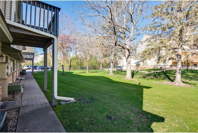 11348 Ibis St NW, Coon Rapids, MN 55433 - view of yard with a balcony