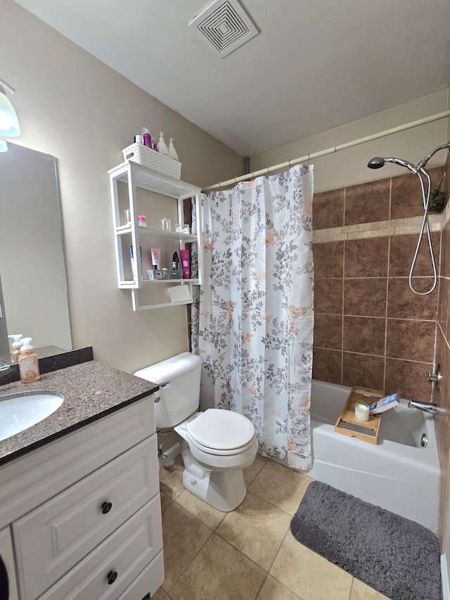 11348 Ibis St NW, Coon Rapids, MN 55433 - bathroom featuring vanity, tile patterned flooring, and shower / bath combo with shower curtain