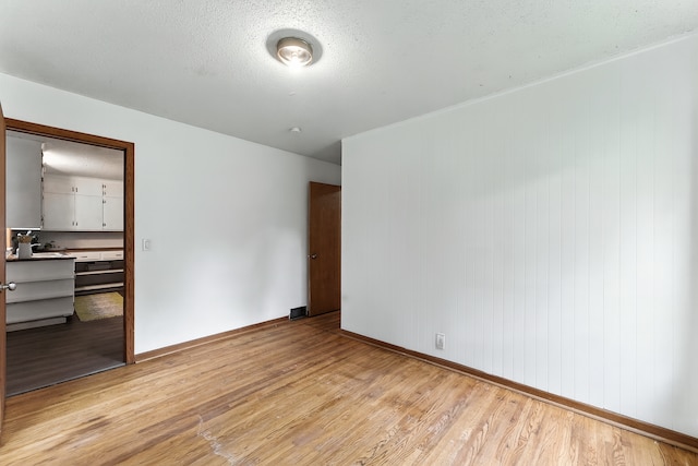 4951 Newton Ave N, Minneapolis, MN 55430 - spare room with light wood-style flooring